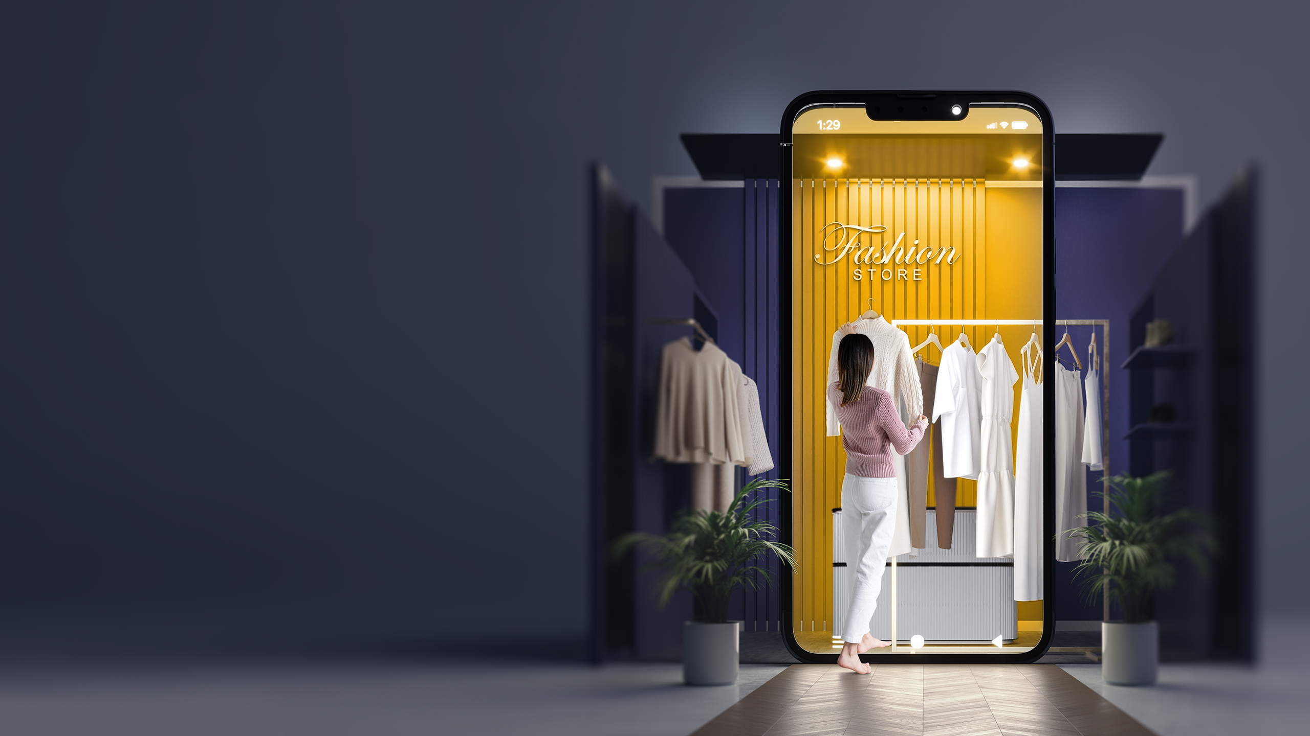 Woman is shopping clothes inside a giant mobile phone